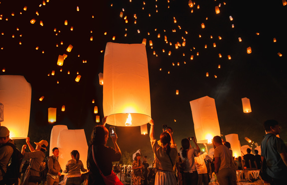 Floating lanterns at night at a festival in Thailand