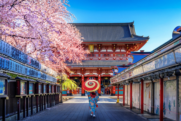 Woman wearing japanese traditional kimono at Temple in Tokyo, Japan.