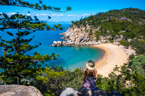 Woman overlooking Magnetic Island beach, Australia